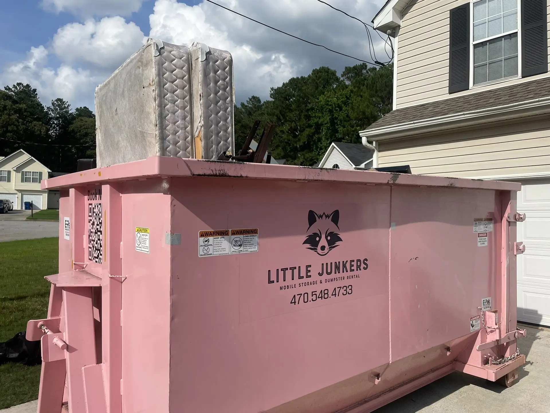 Trash inside a 16 yard dumpster in Fairburn Ga