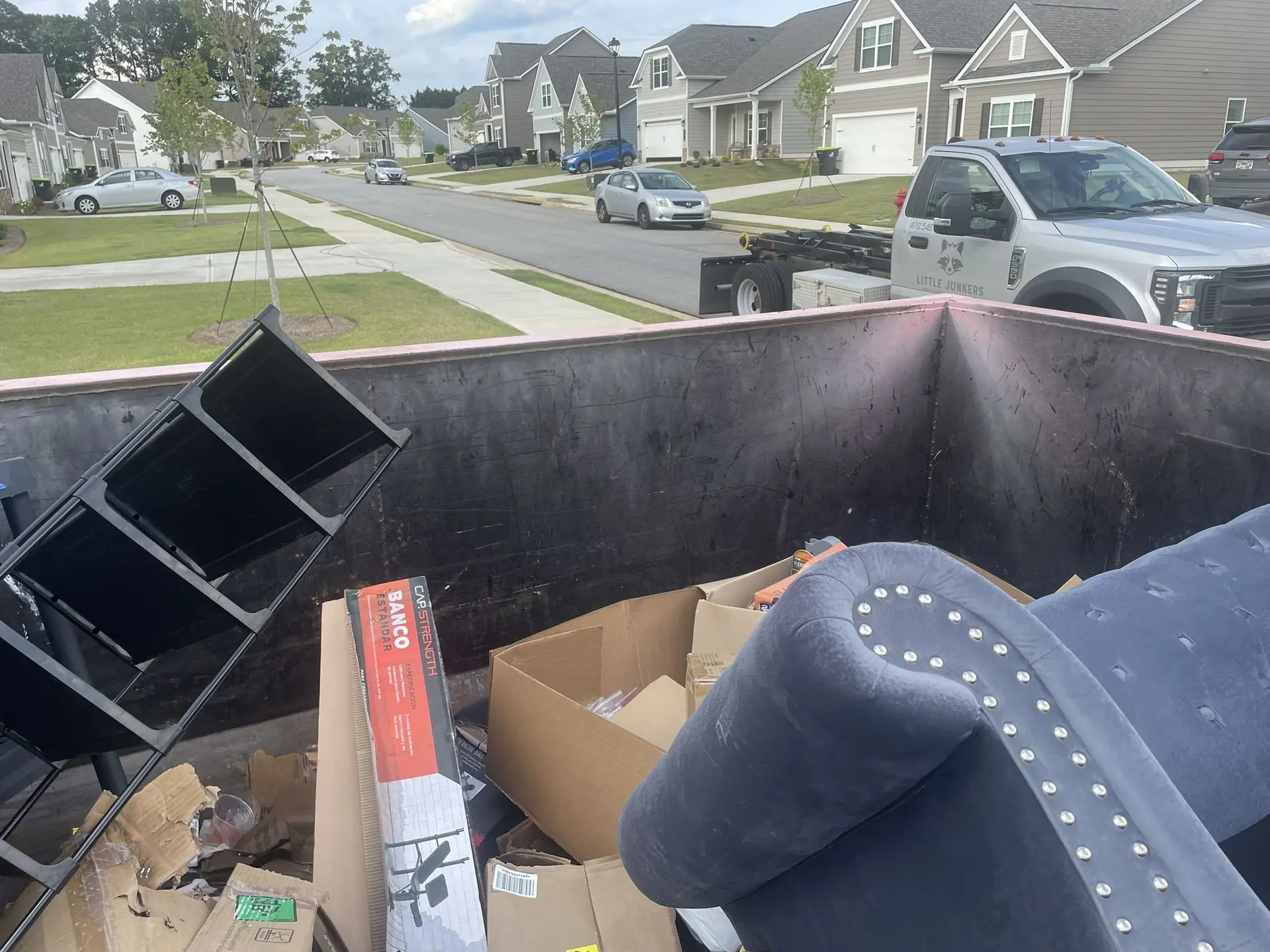 Trash inside a 11 yard dumpster in McDonough