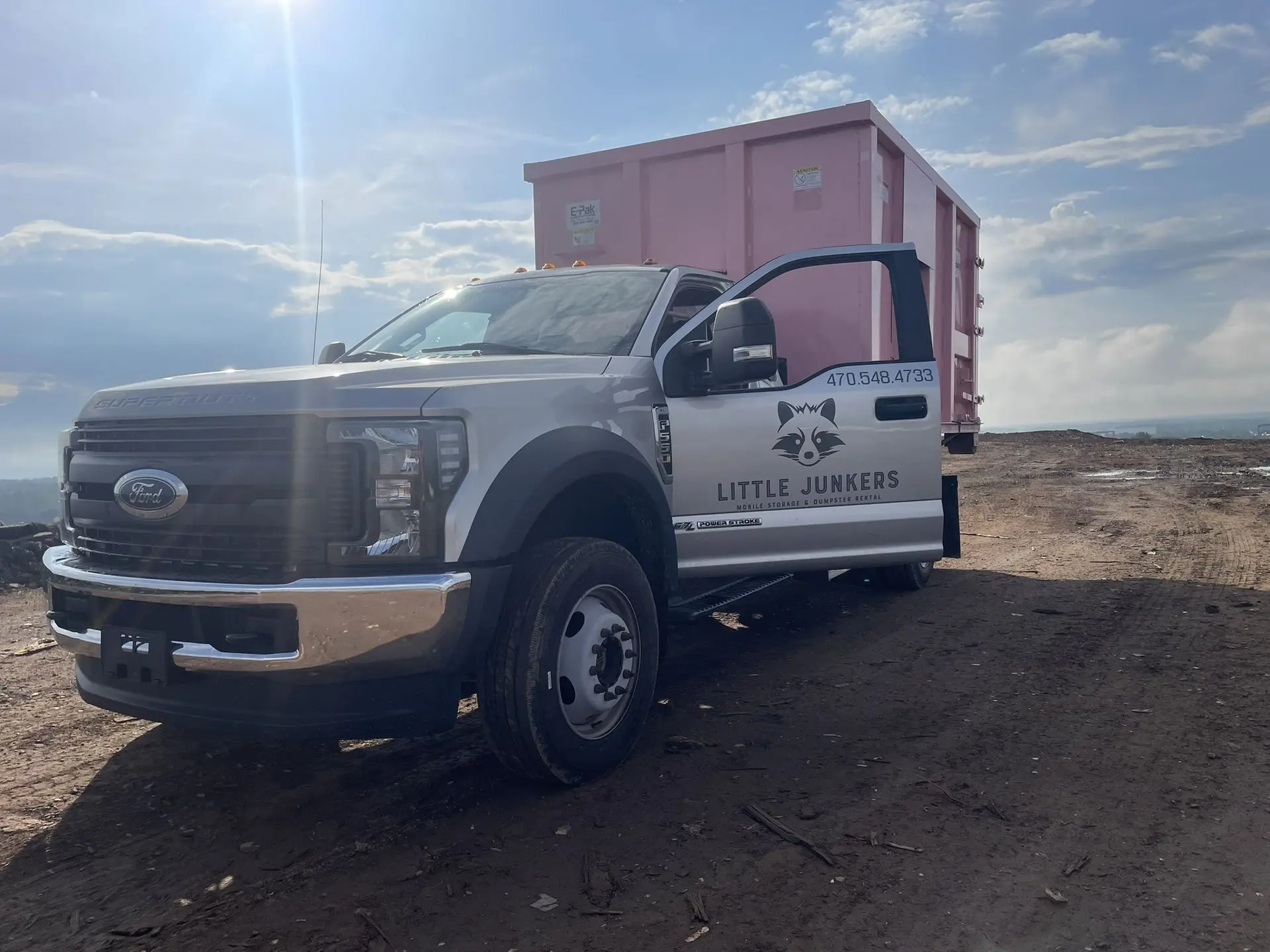 Little Junkers truk with 21 yard dumpster