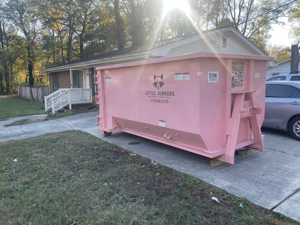 16 Yard dumpster in driveway