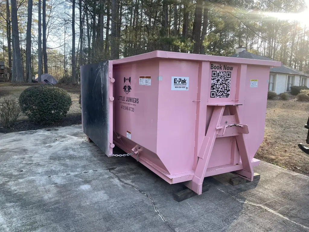 16 Yard dumpster with door open